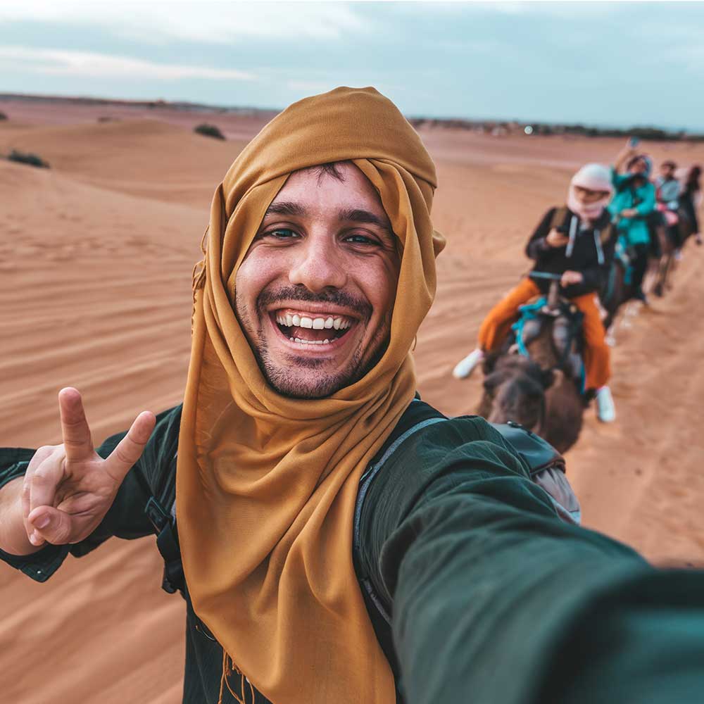 desert camel ride selfie
