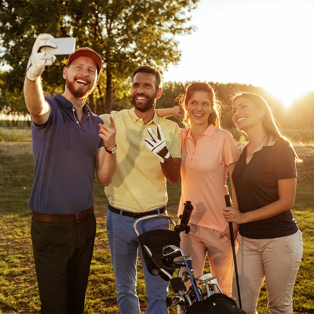 friends taking a golf selfie