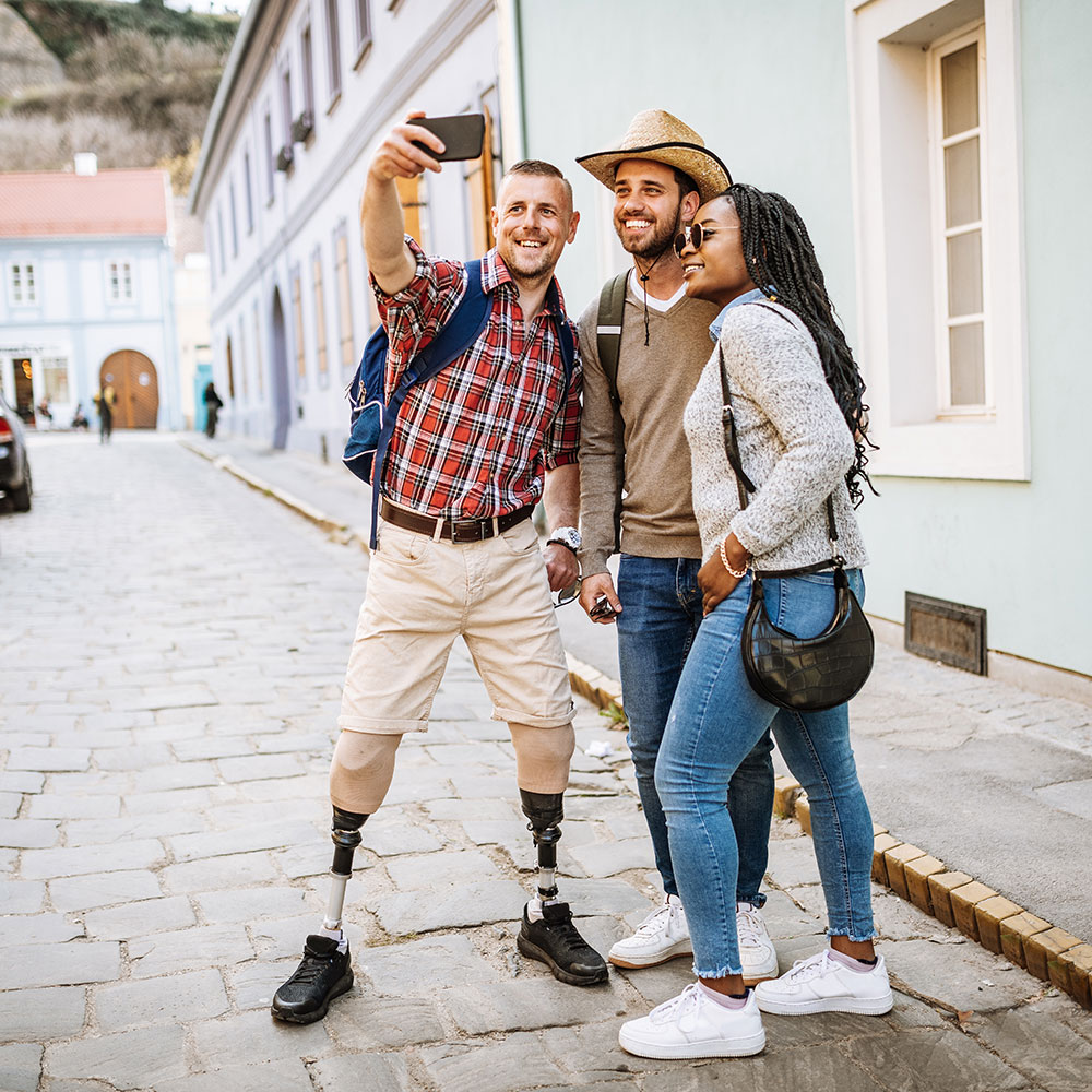 three friends taking a selfie while traveling