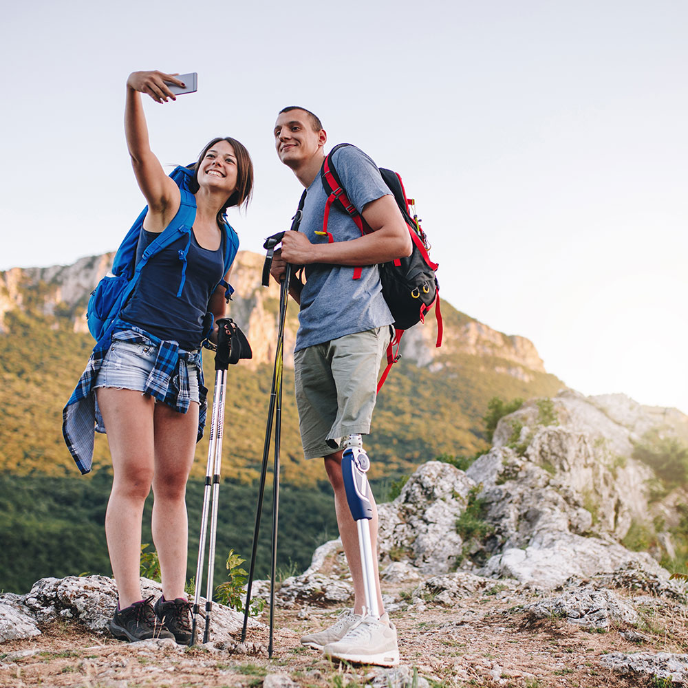 couple taking selfie while hiking