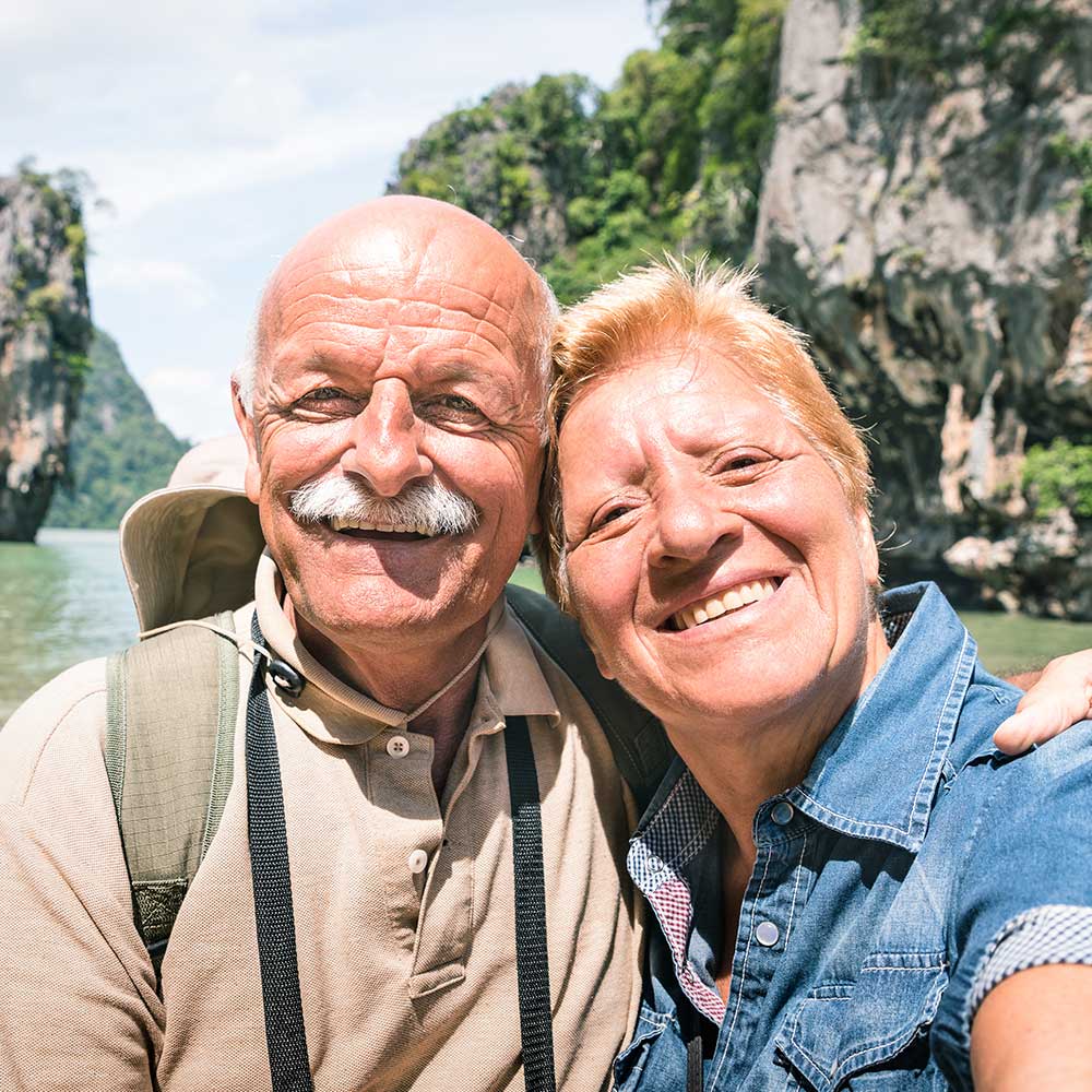 older couple taking a selfie