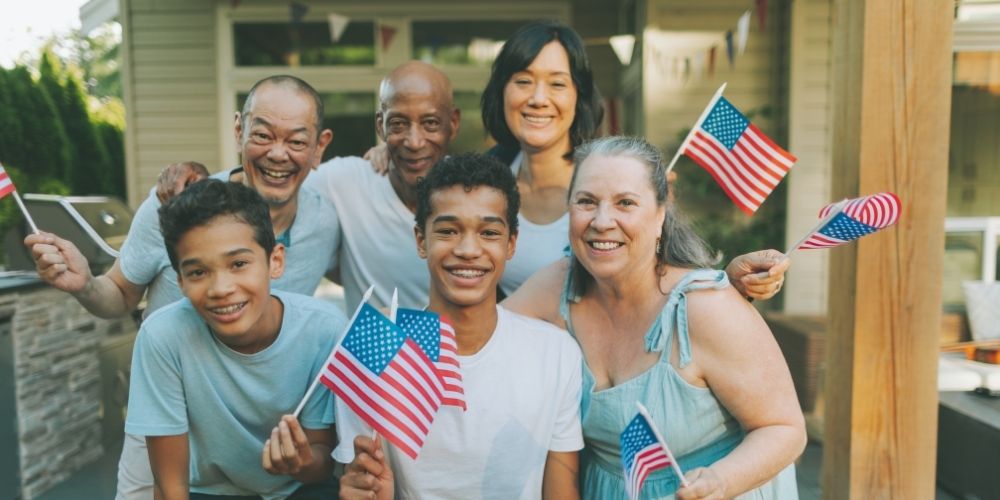 family group photo with american flags