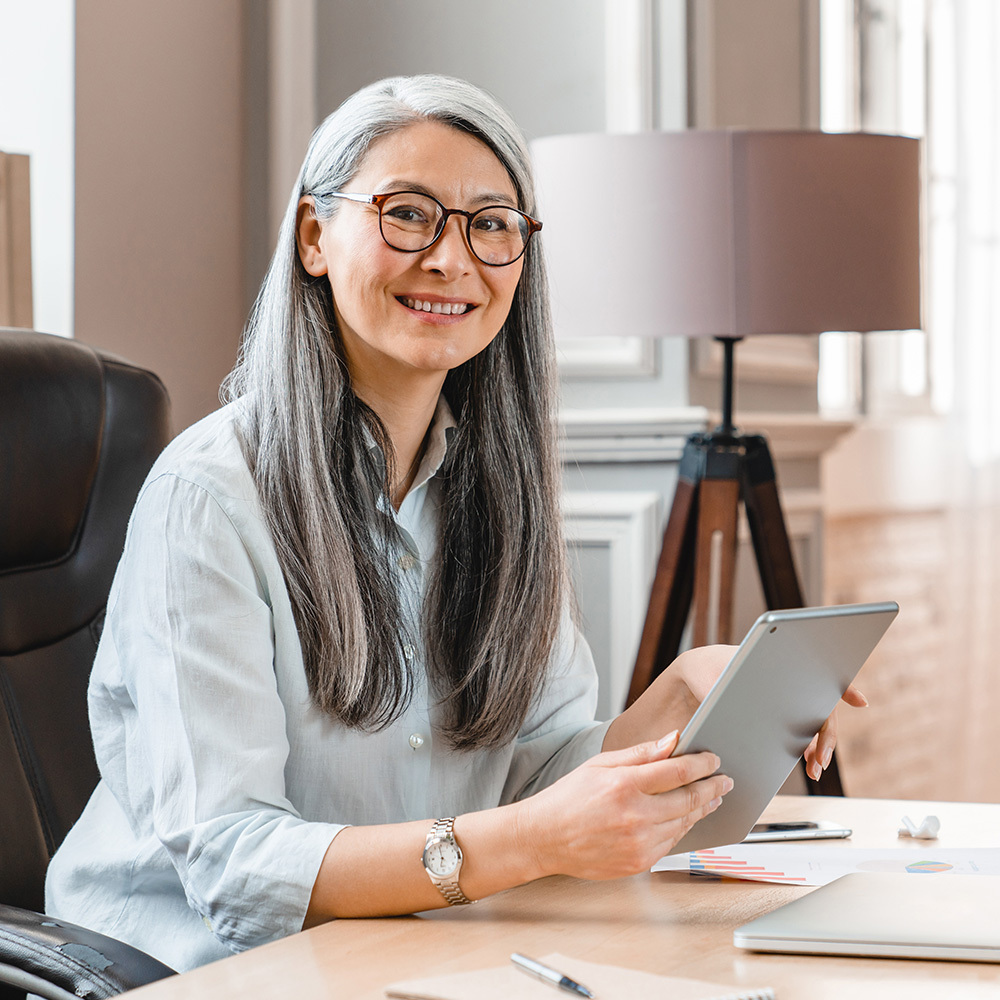 woman working and smiling