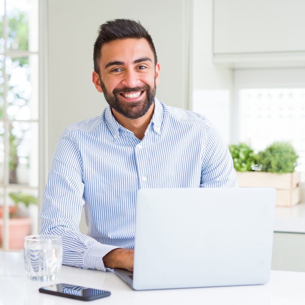 man working on laptop